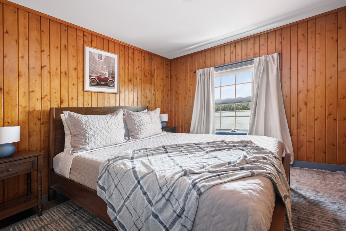 Third bedroom, queen bed, fresh linens — everyone gets their own space and nobody shares unless that was the plan all along.
