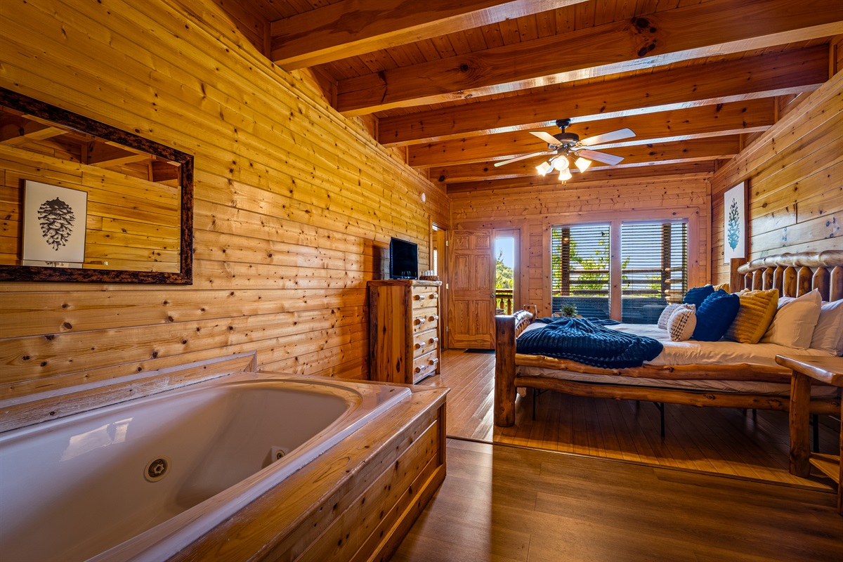 Spacious main floor king BR 2 suite with private deck, bathroom and jacuzzi tub

