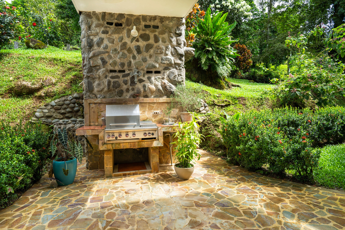 Built-in stone BBQ and outdoor entertaining area