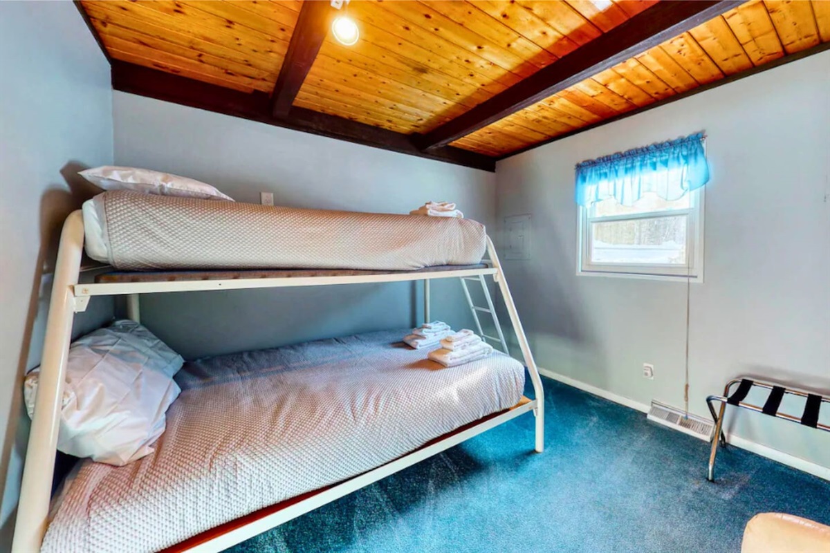 Another angle of the 2nd bedroom on the first floor of this cozy cabin! 