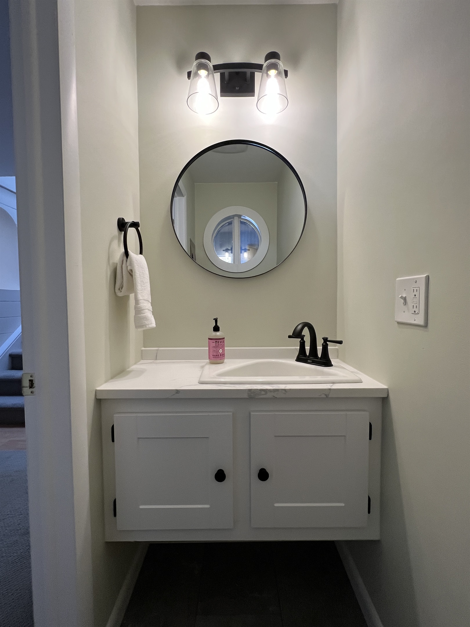 Powder room located just off main entry.