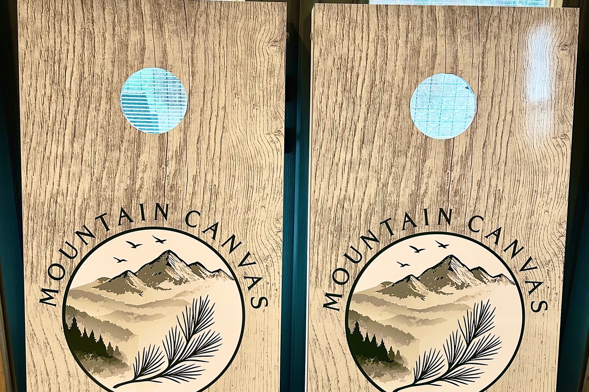 Mountain Canvas fun with a rustic twist. These custom cornhole boards bring laid back competition and outdoor vibes to your stay. Toss a few bags, cheer each other on, and enjoy easy moments surrounded by mountain air.