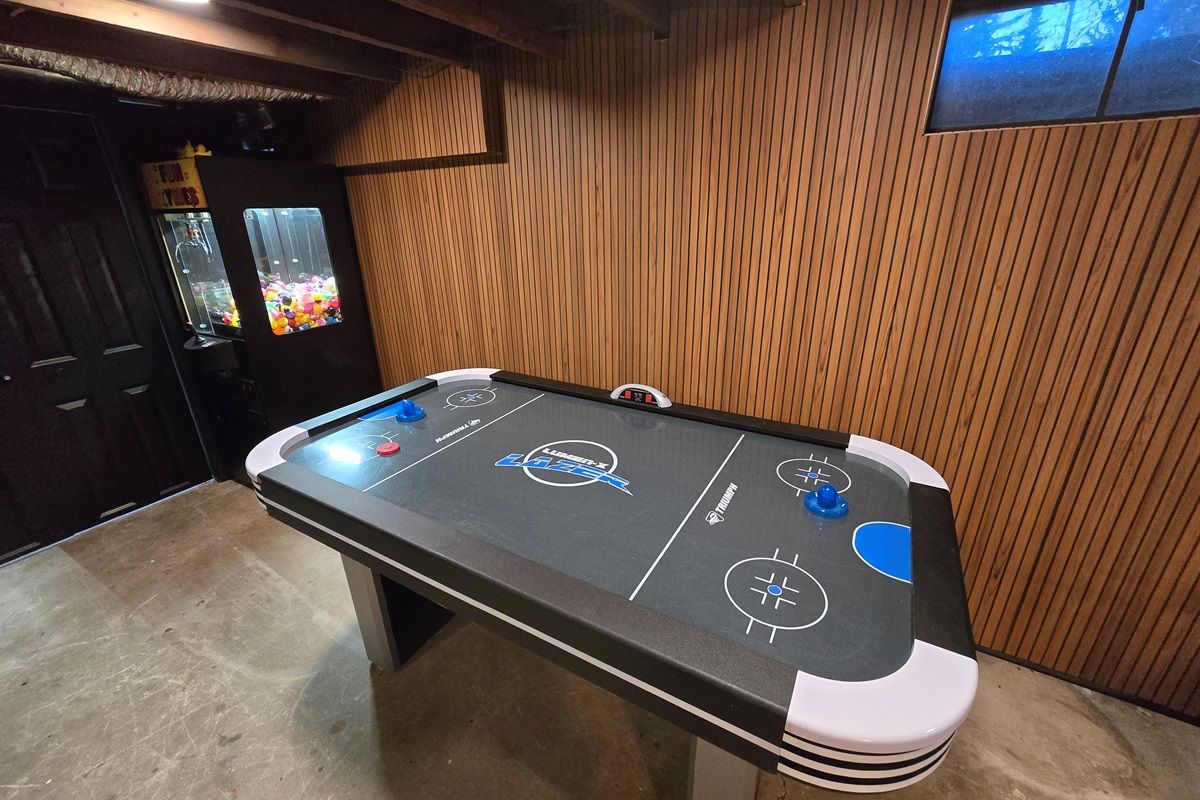 Glide into fun with our air hockey table!  Fast-paced action for all ages in this cozy basement retreat. Who’s ready to win? 