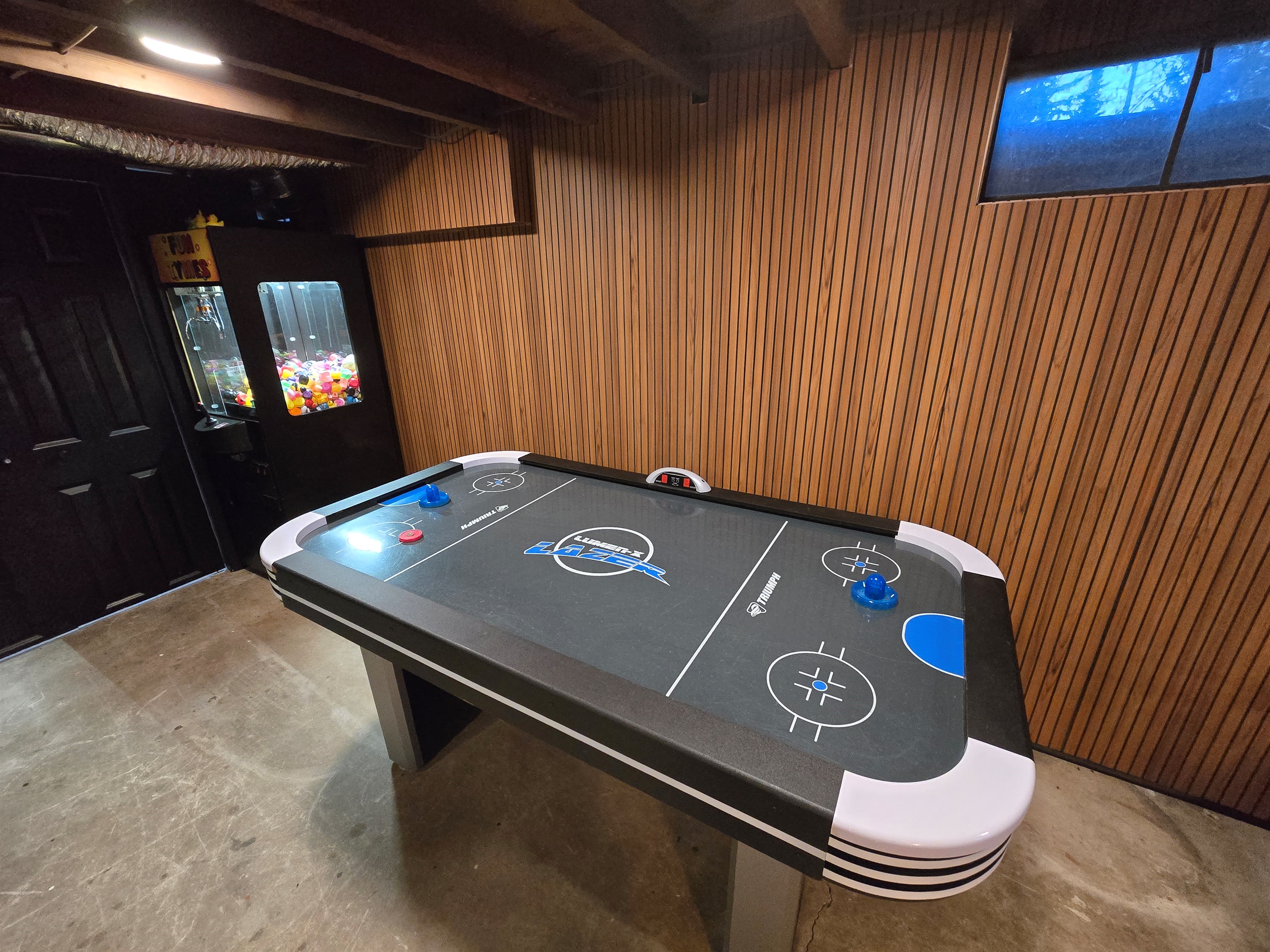 Glide into fun with our air hockey table!  Fast-paced action for all ages in this cozy basement retreat. Who’s ready to win? 