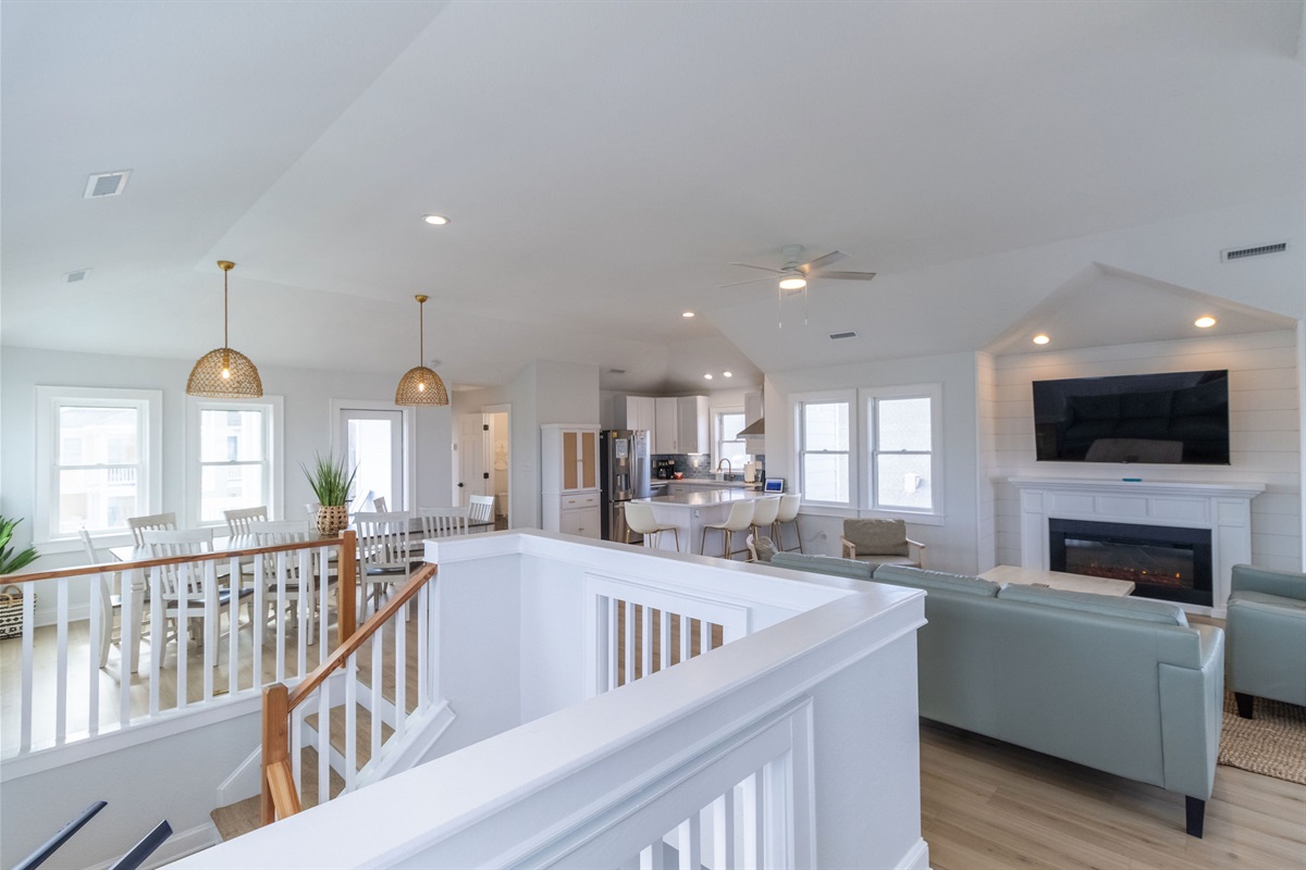 Lots of windows provide natural lighting throughout the top floor. Enjoy the sun and ocean without being outside.