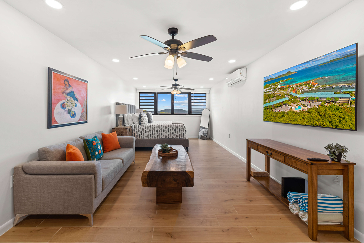 Continue down the hallway and you will enter the main living area with an AC unit to keep the whole place cool. **AC has a sump