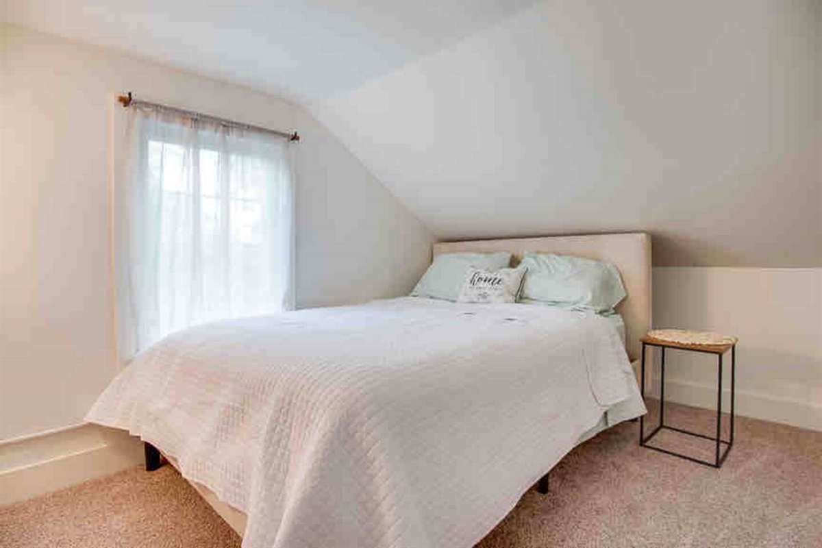 Queen Bed! The ceiling here is sloped so be careful tall people!! It’s just what you want after a long day on Main Street or playing baseball, a cozy, comfy, bed that you will sleep like a baby in and get recharged for the next days adventures!