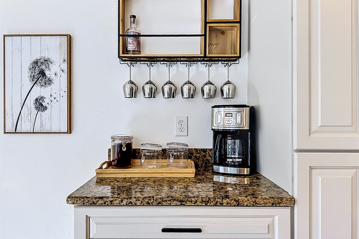Wake up each morning to a fresh cup of coffee - we have a drip coffee maker, along with complimentary ground coffee and sugar.