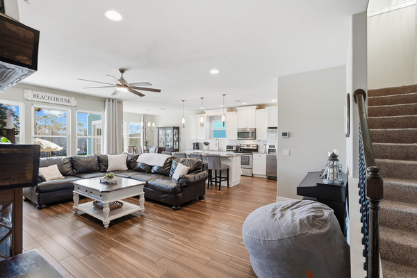Comfortable coastal living room with plenty of seating for guests to gather and unwind.