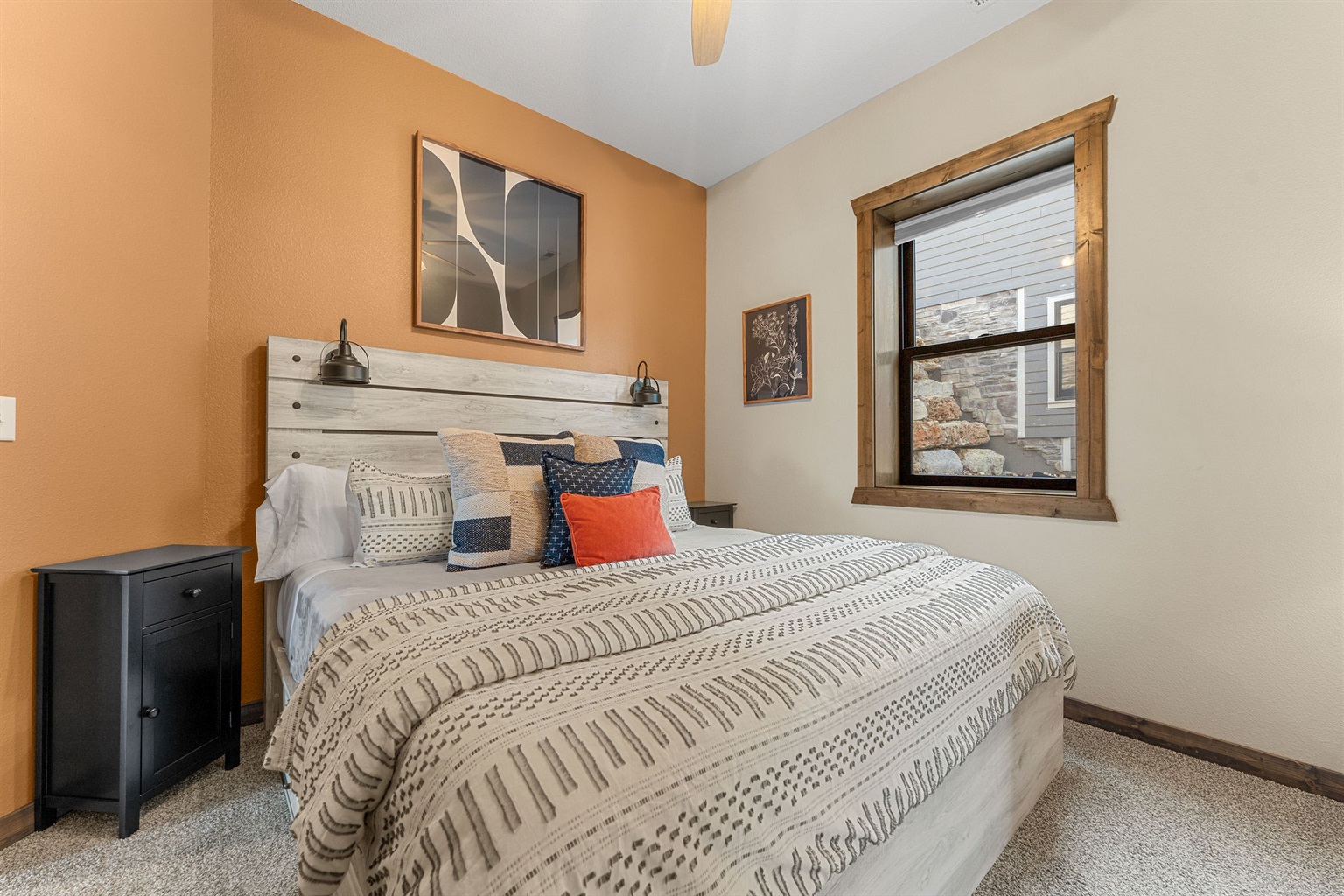 Inviting king bedroom  with stylish accents & comfy bedding and jack n jill bath 
