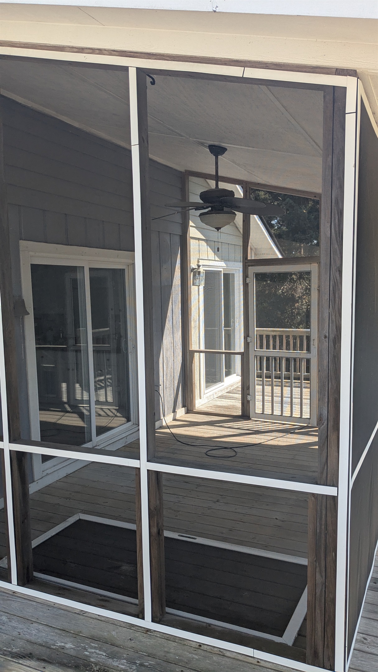 The screened in porch on the back deck will be a perfect place to enjoy the outdoors without worrying about bugs!