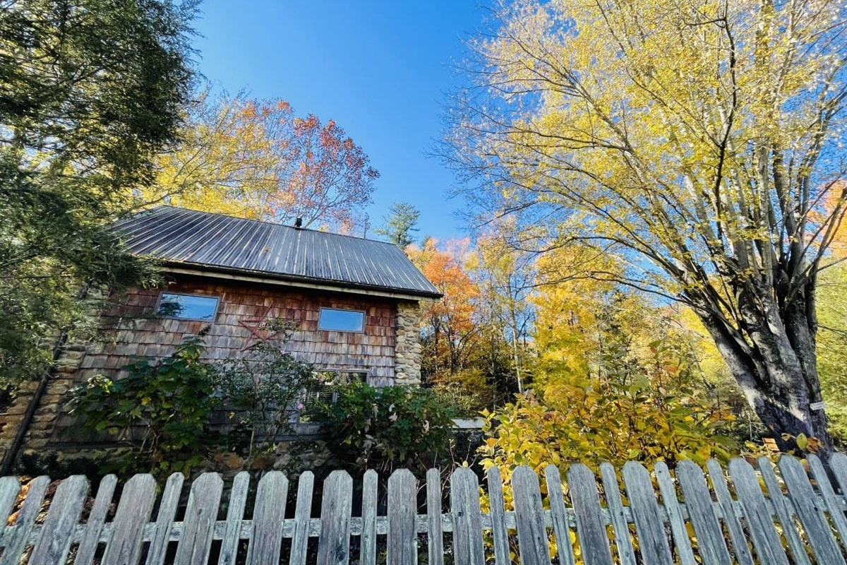Street view of Stone Cottage in the Fall