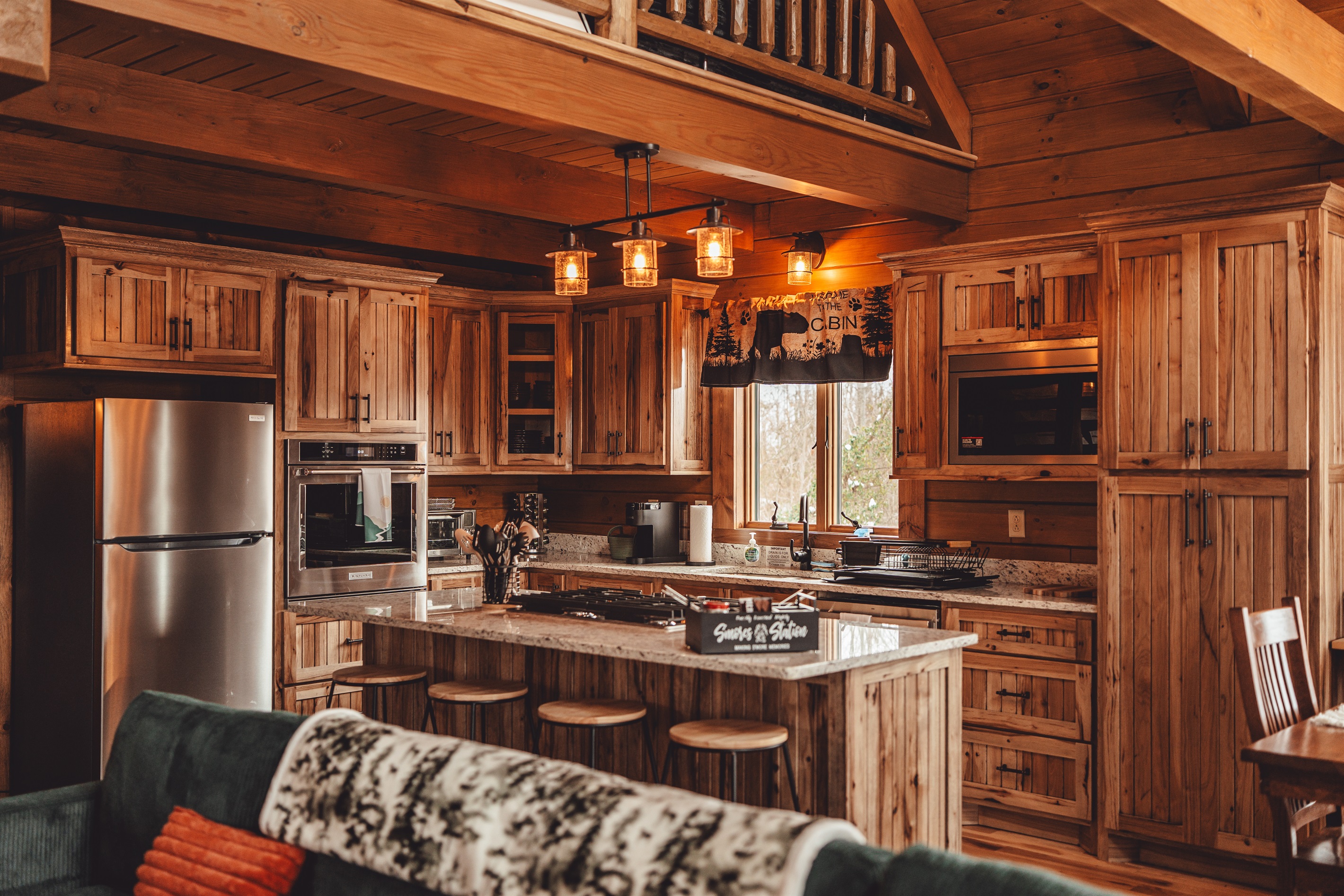 Kitchen is Stocked with Everything You Need Including:  Dinnerware, Flatware, Drinkware, Pots, Pans, Utensils, and even Children's Dinnerware and Booster High-Chair for Little Ones