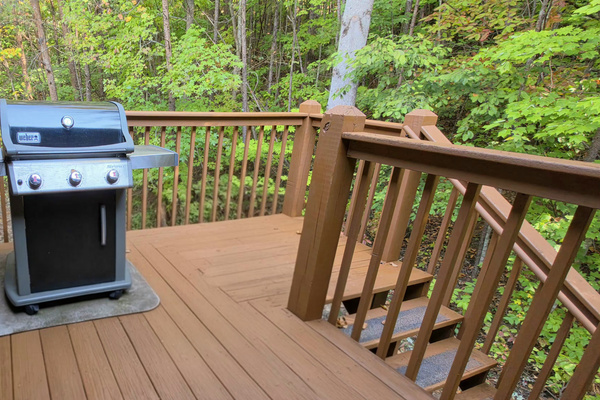 Gas grill on the deck just off the kitchen for easy outdoor cooking. 