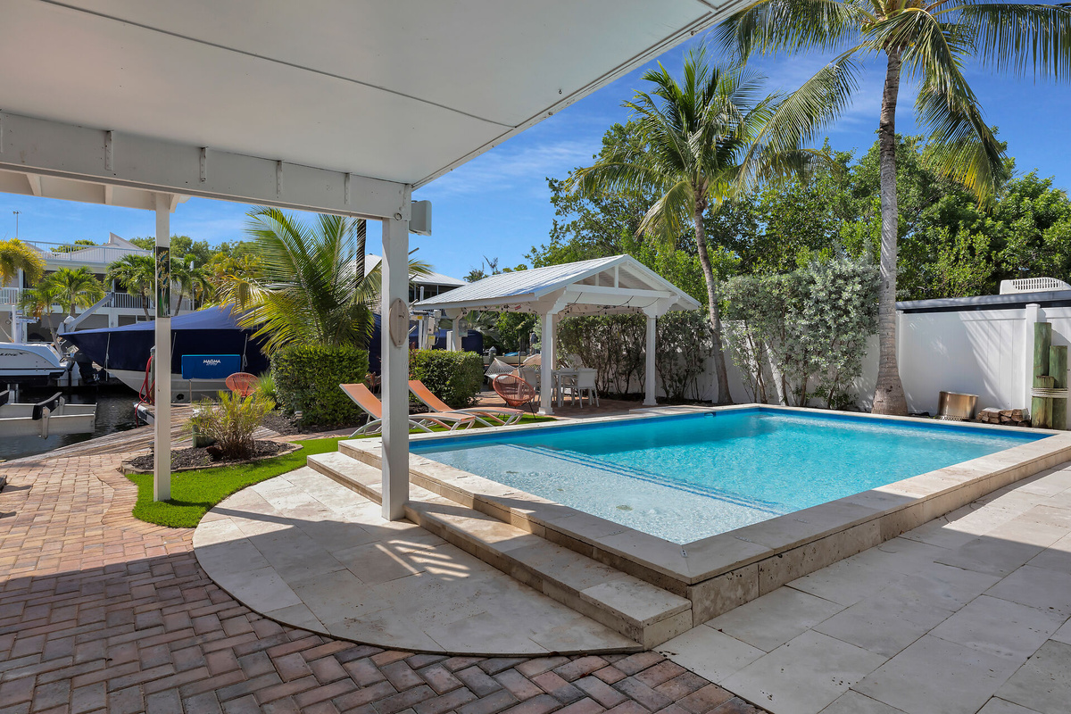 Shaded veranda next to pool