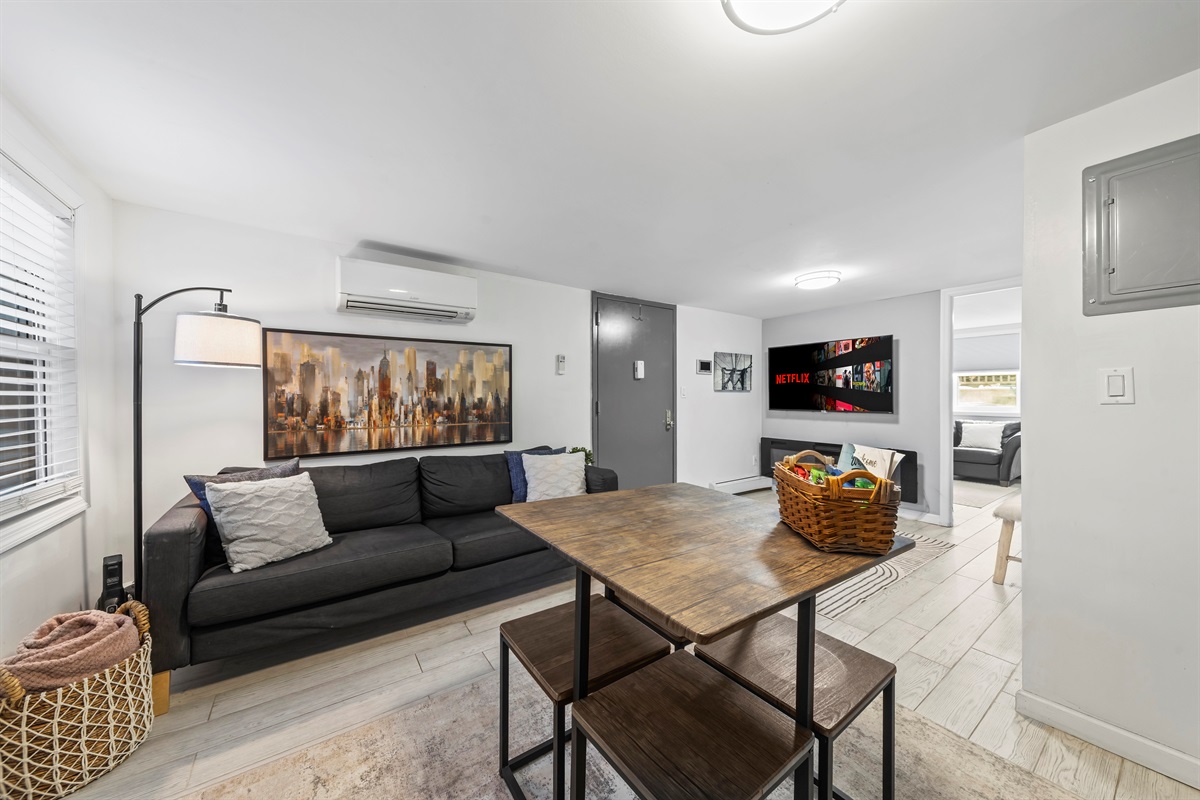 Settle in for movie nights, good conversation, or quiet downtime in a living room designed for easy city living.