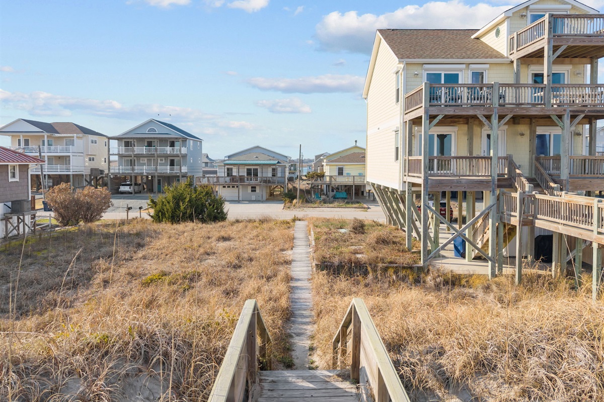 Private boardwalk beach access just steps from the home