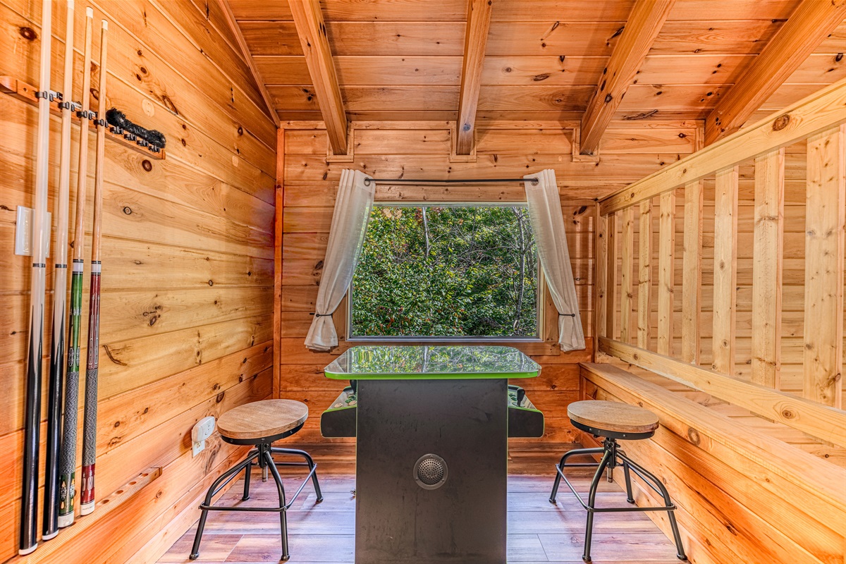 Your inner kid will love this retro multicade — the perfect cabin hangout spot