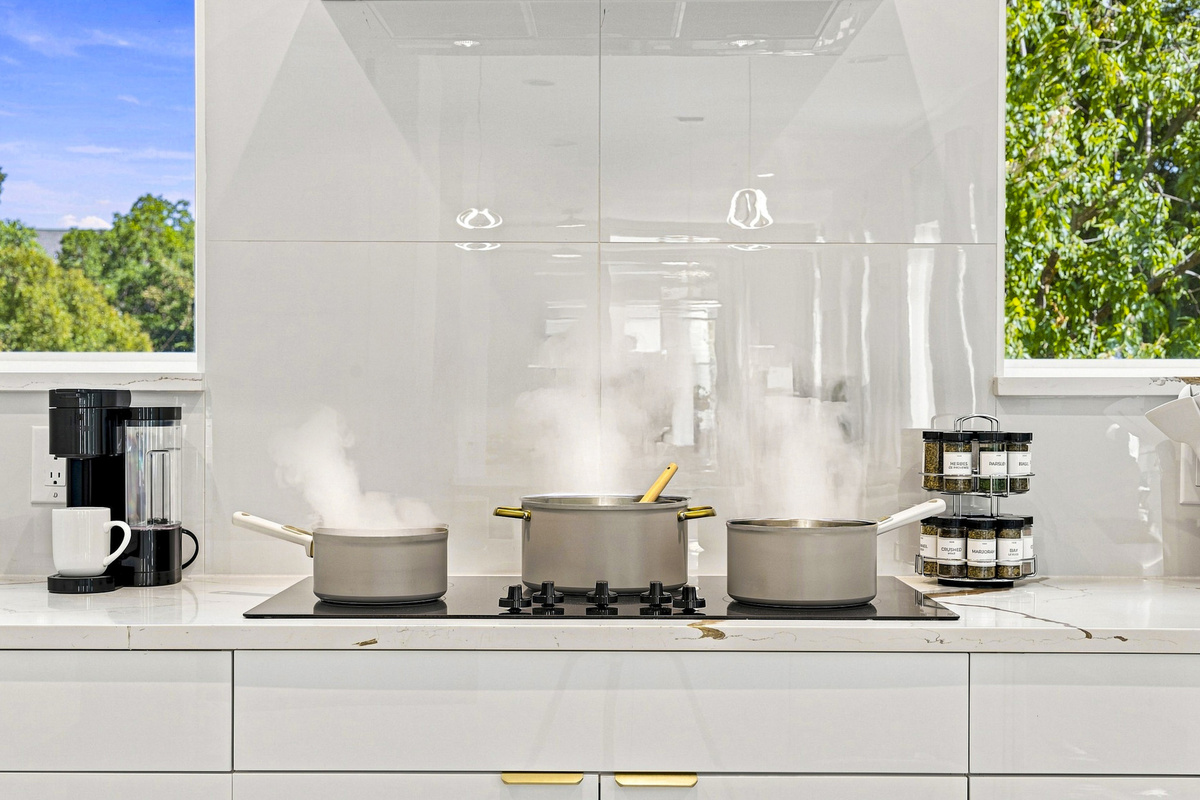 Cook up a storm in this stylish space with sleek appliances and vibrant views!