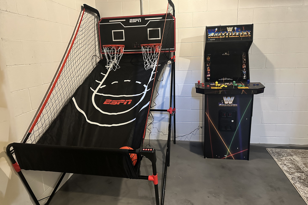 Rainy day? No problem! The basement game room features basketball arcade and a classic WWE arcade game for hours of indoor fun.