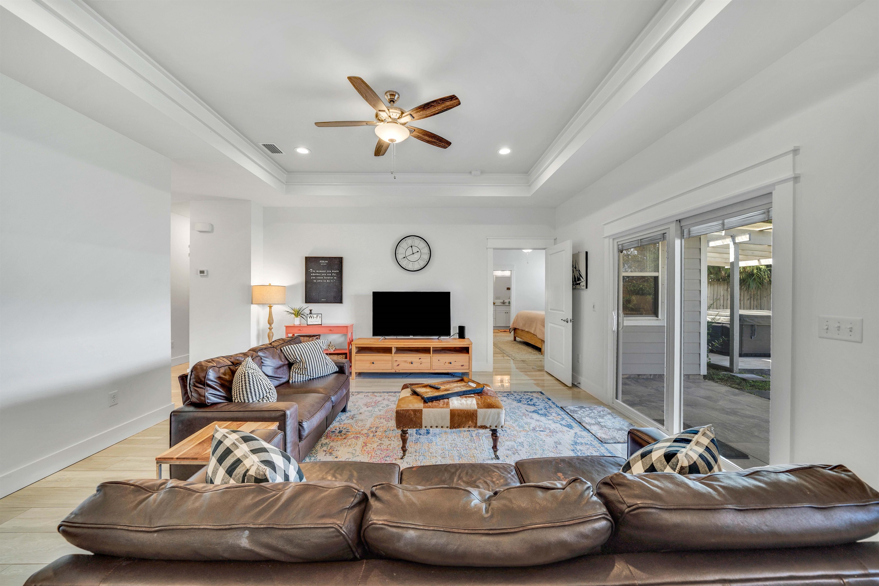 There is plenty of room for everyone to gather around the coffee table for a board game.