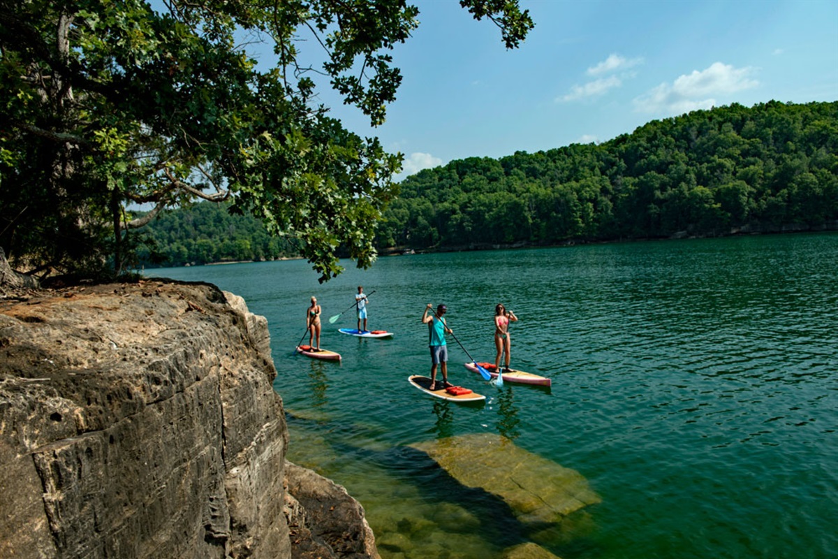 A dreamy Beaver Lake girls getaway means paddle boarding, emerald water, and quiet coves made for relaxing, laughing, and soaking up the Northwest Arkansas sunshine.