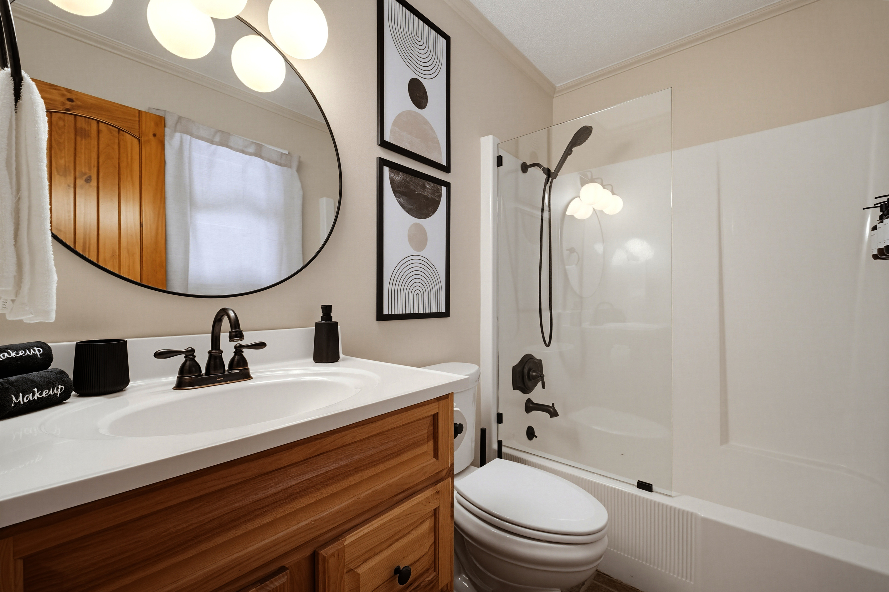 {Ensuite Bathroom 1} Bright and beautifully appointed, this private ensuite offers a spacious walk-in shower and modern finishes for a refreshing start to every day.