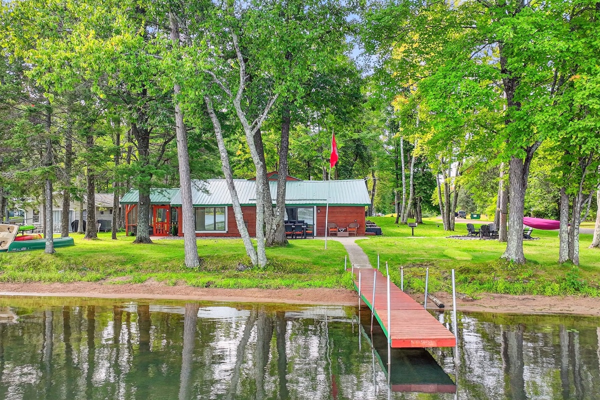 With sandy frontage and shallow water, this home is great for kids to splash around, or put your chair in the water.