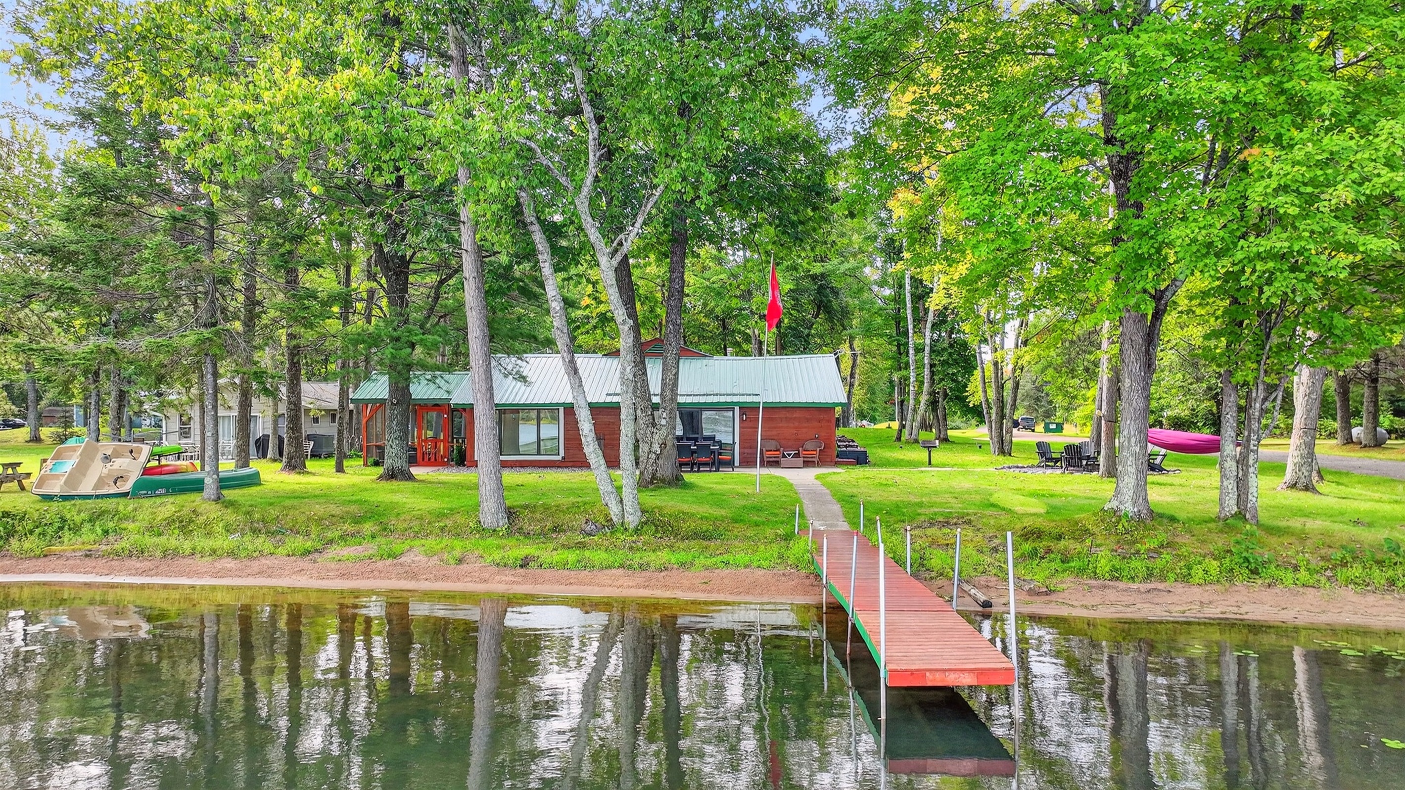 With sandy frontage and shallow water, this home is great for kids to splash around, or put your chair in the water.