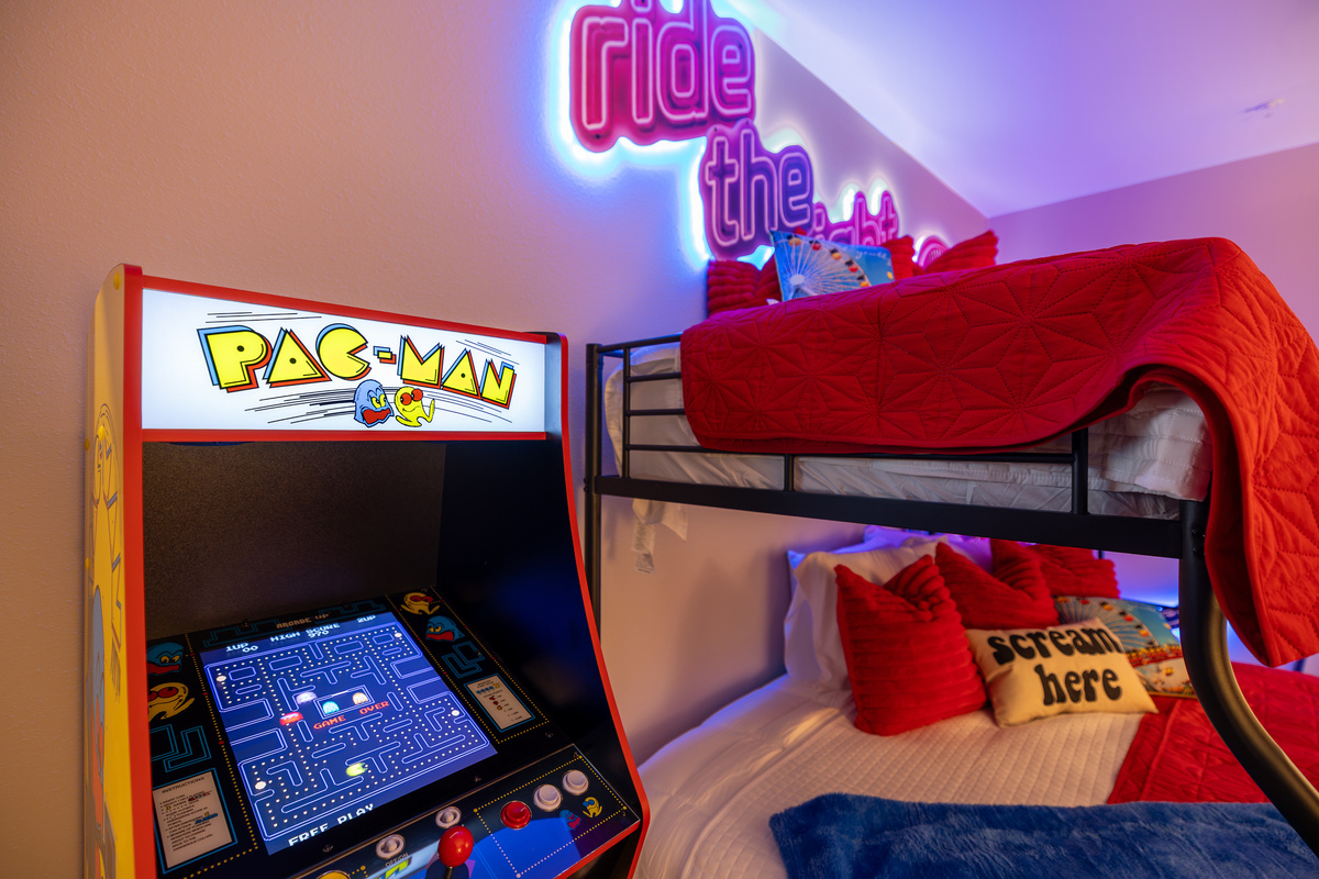 PAC-MAN aglow beside the 'Scream Here' bunk.