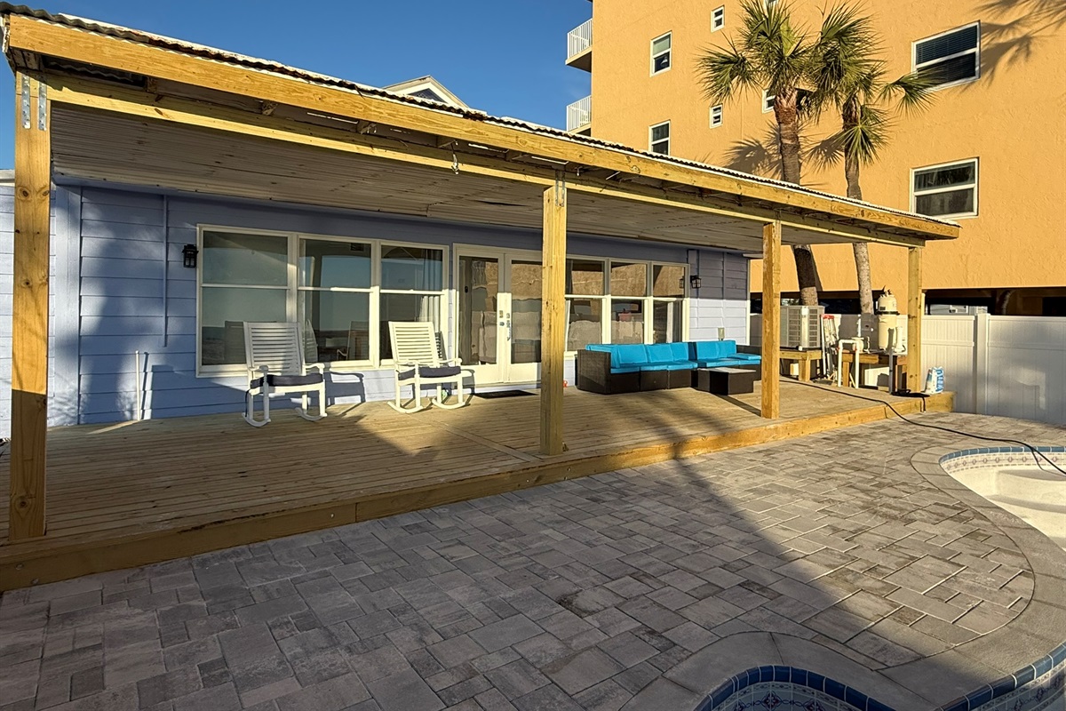 Large Private Deck with Rocking Chairs and Couch Seating.