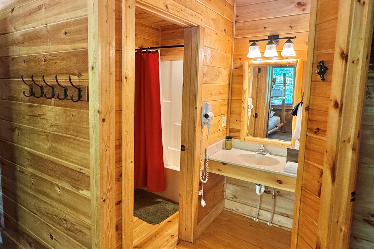 Cub room private bathroom, separated sink area.