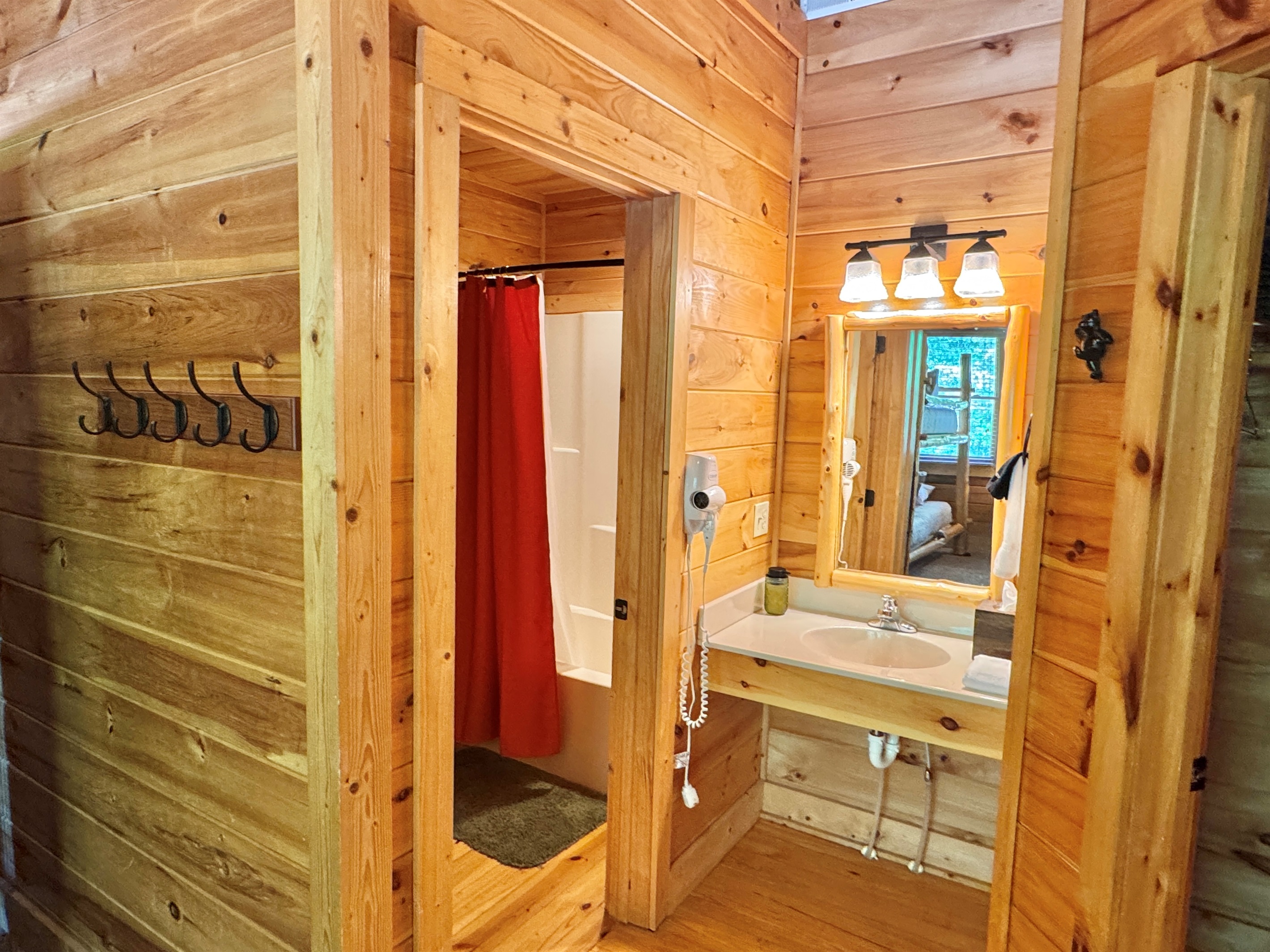 Cub room private bathroom, separated sink area.