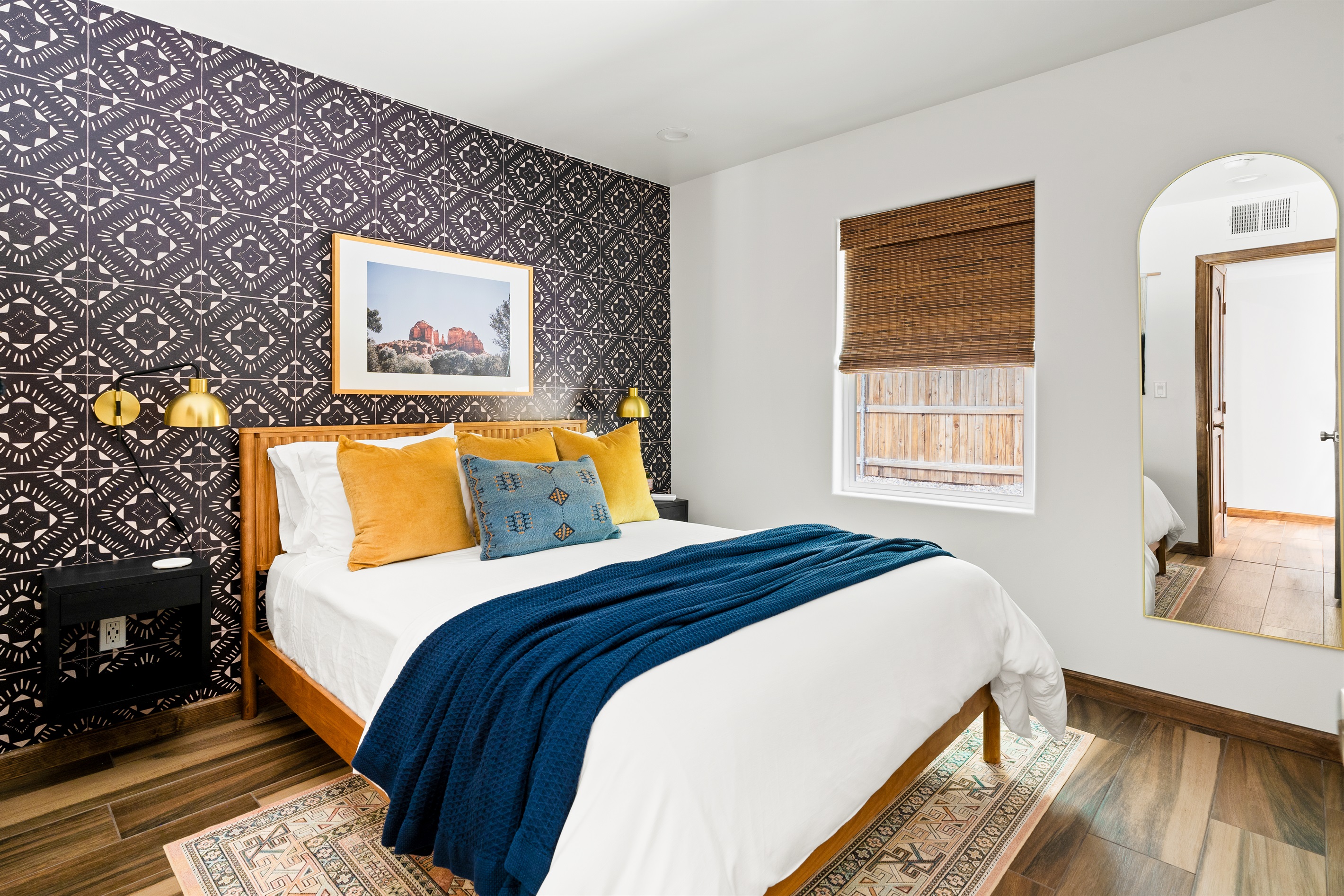 Perfect setup for a relaxing stay with a queen bed and soft bedding.