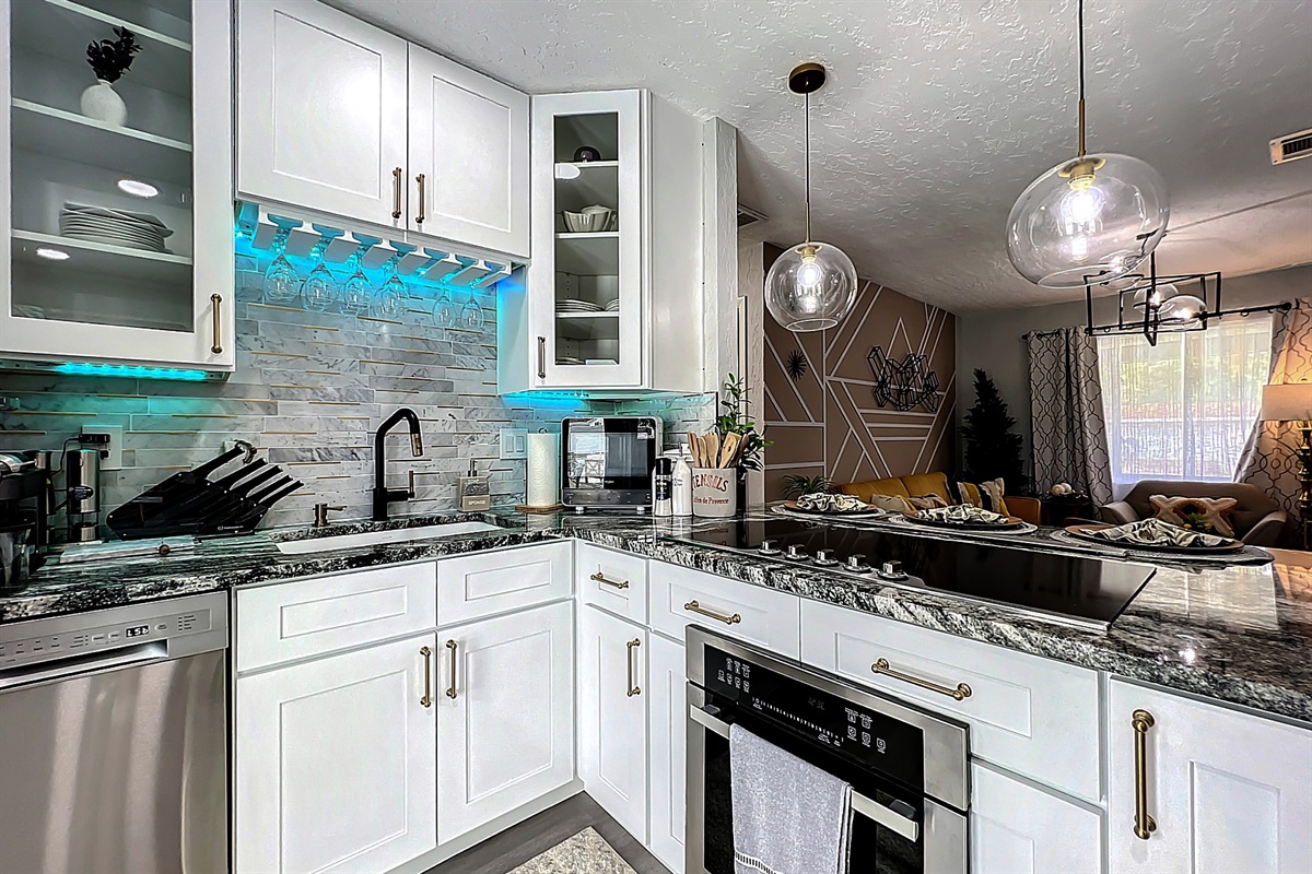 Kitchen 2 modern with granite and all cooking supplies