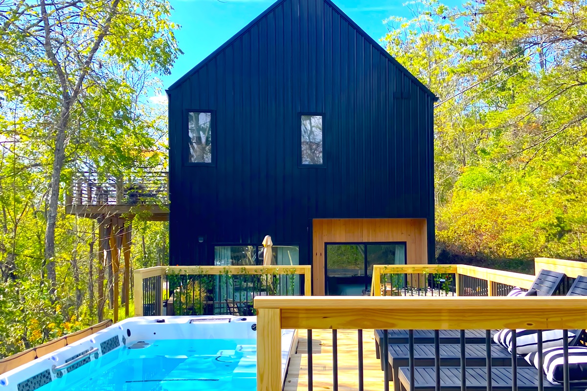 {Deck} Enjoy the Heated Swim Spa, Fire Pit, or Cold Plunge.