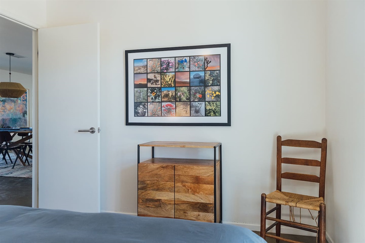Bedroom adjacent to dining room and living room areas.