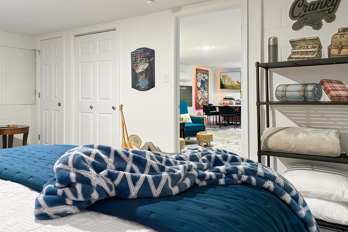 Turn in under the lake-sunset canvases — a restful queen that sends everyone home rested.