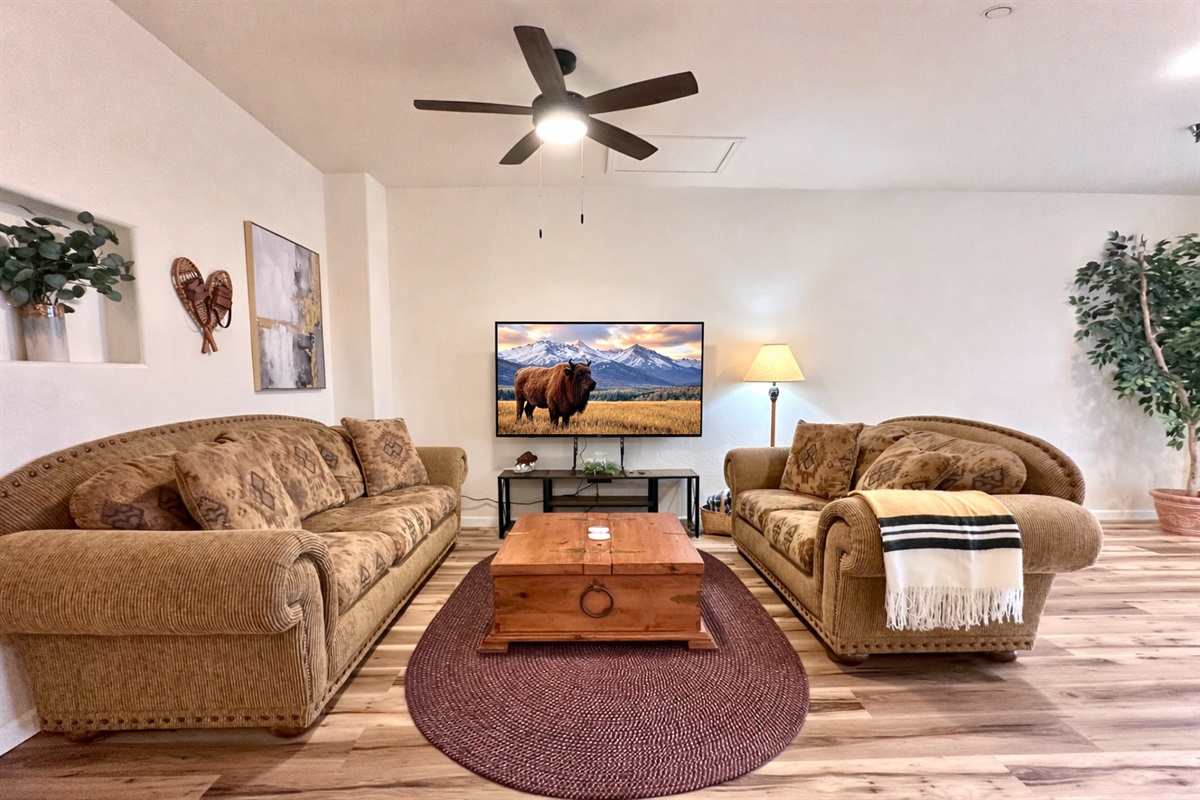 Cozy seating area with new large smart tv