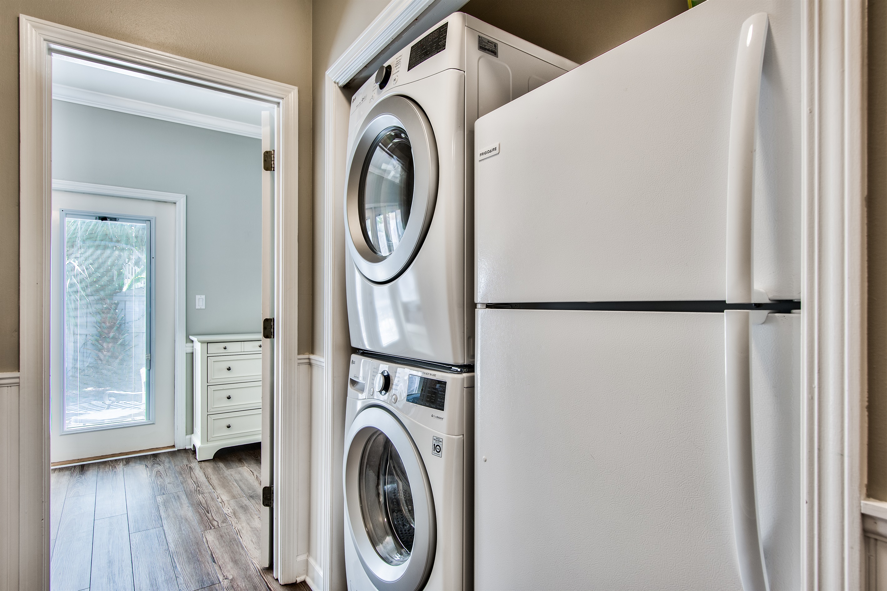 Hall Laundry room with full‑size washer and dryer