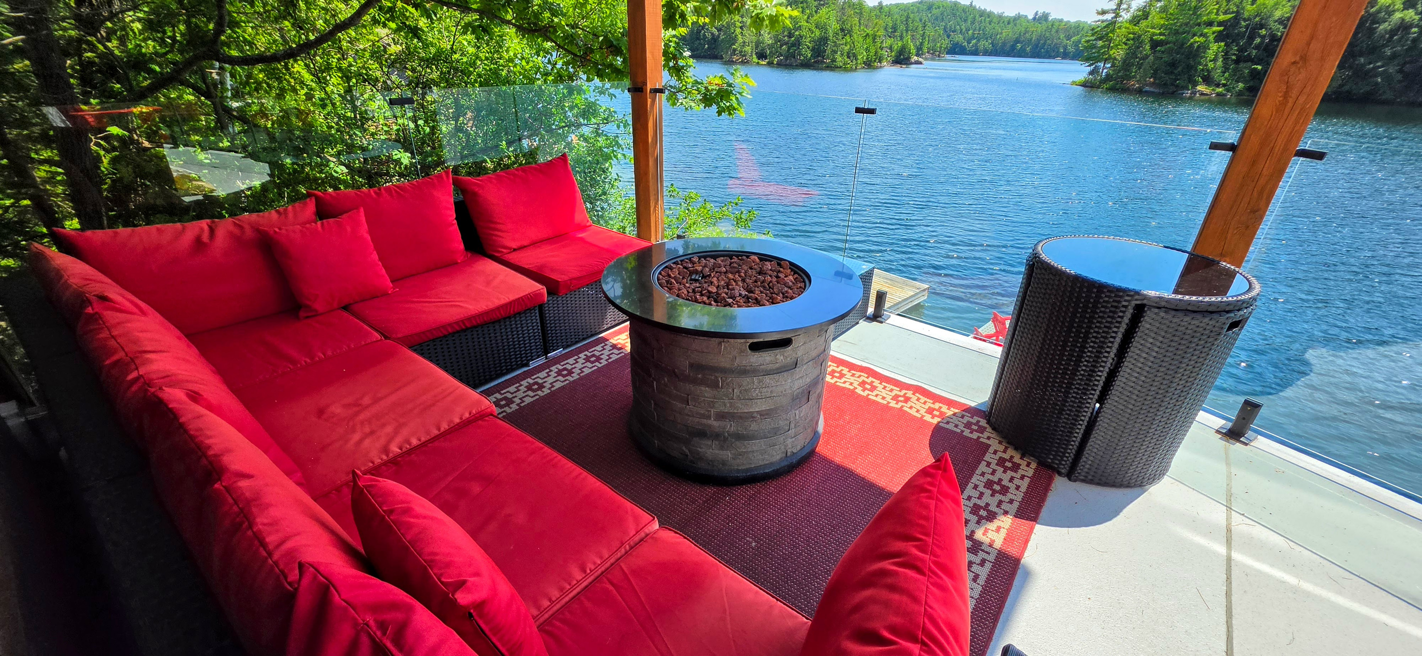 Upper balcony seating and fire pit area overlooking Lac McGregor