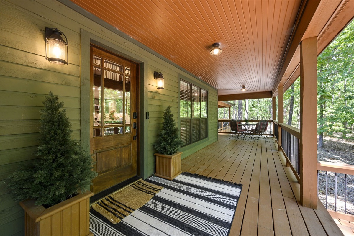 The wrap about porch provides ample seating areas.