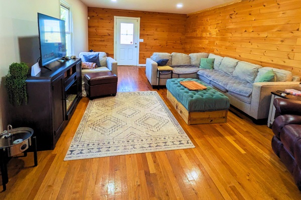 Relax in our bright and cozy living room — the perfect space to unwind after exploring the city, watch your favorite shows, or enjoy a quiet moment with family and friends.