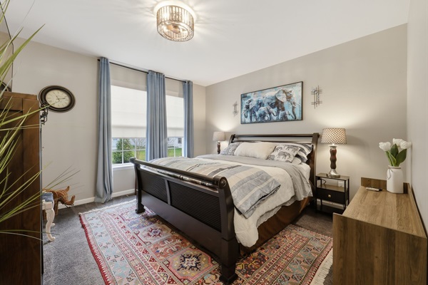 Bedside nightstands equipped with convenient charging ports, white noise machine and electrical outlets.