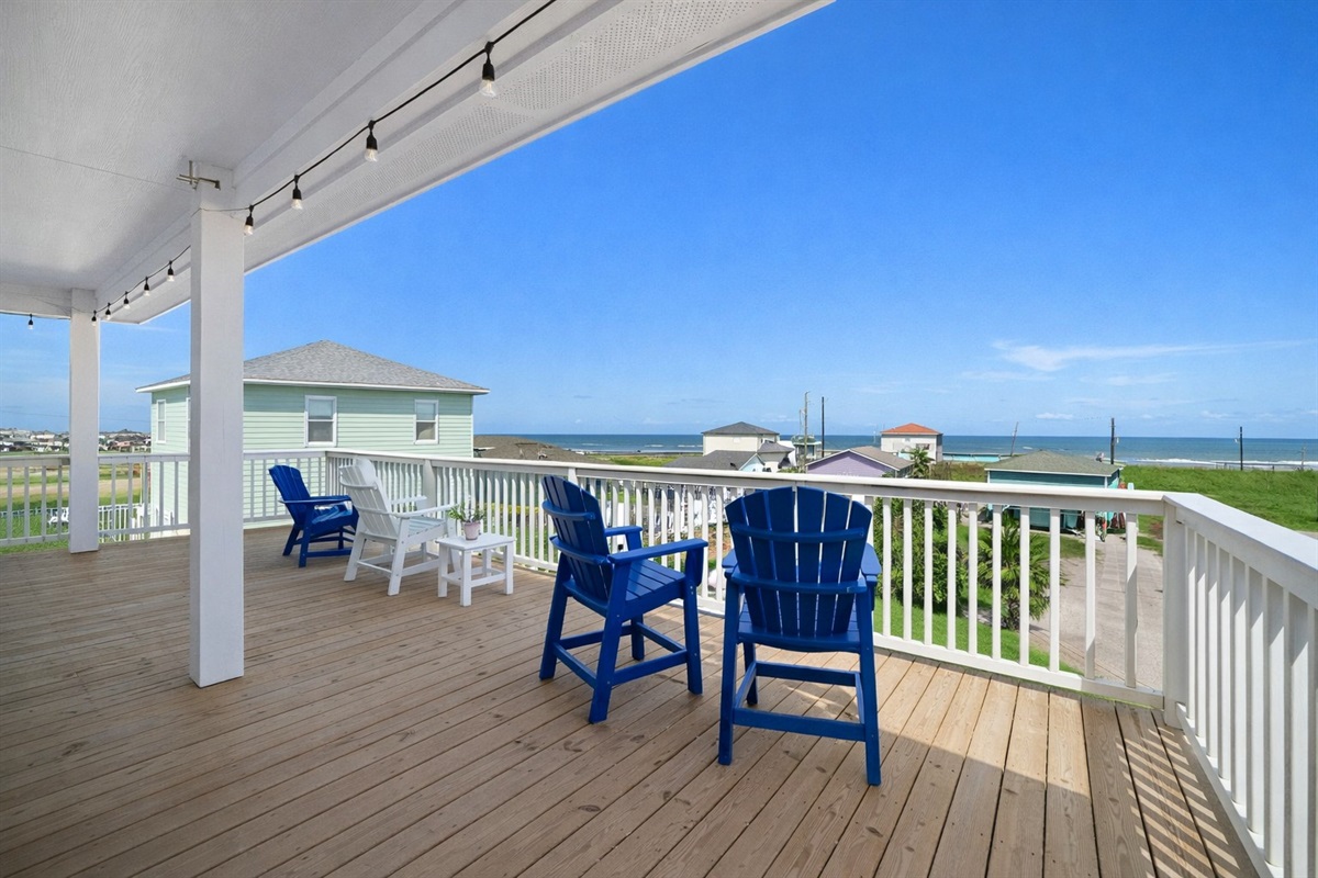 Covered Upper Deck (Upper Level): Relax with ocean breezes and water views from your shaded outdoor lounge.