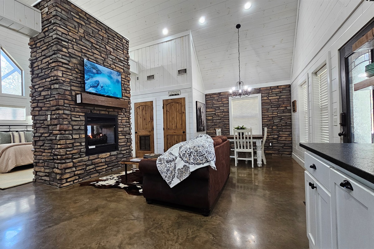 Dining Area: Gather around the rustic table, perfect for meals and memories!
