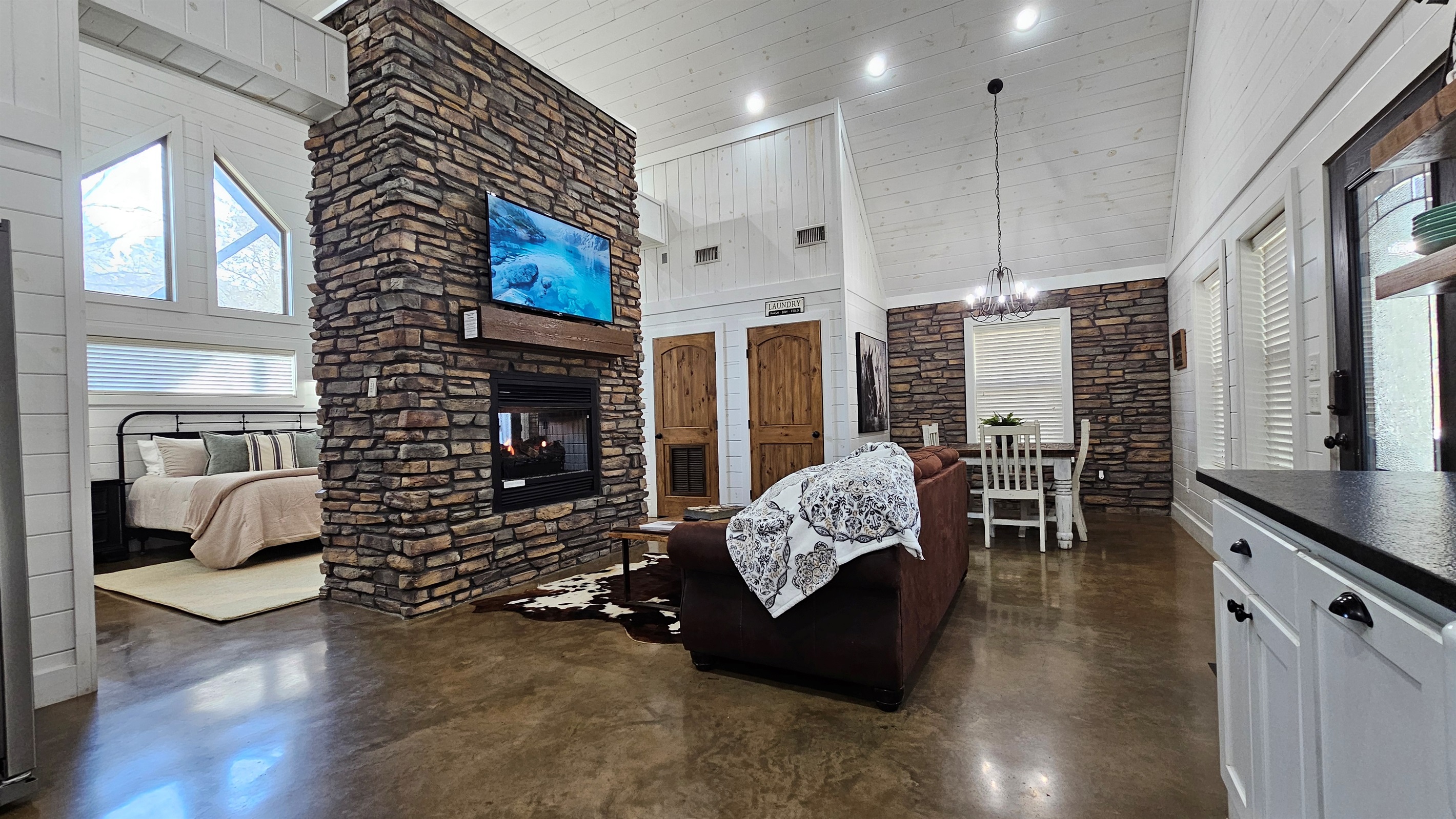 Dining Area: Gather around the rustic table, perfect for meals and memories!