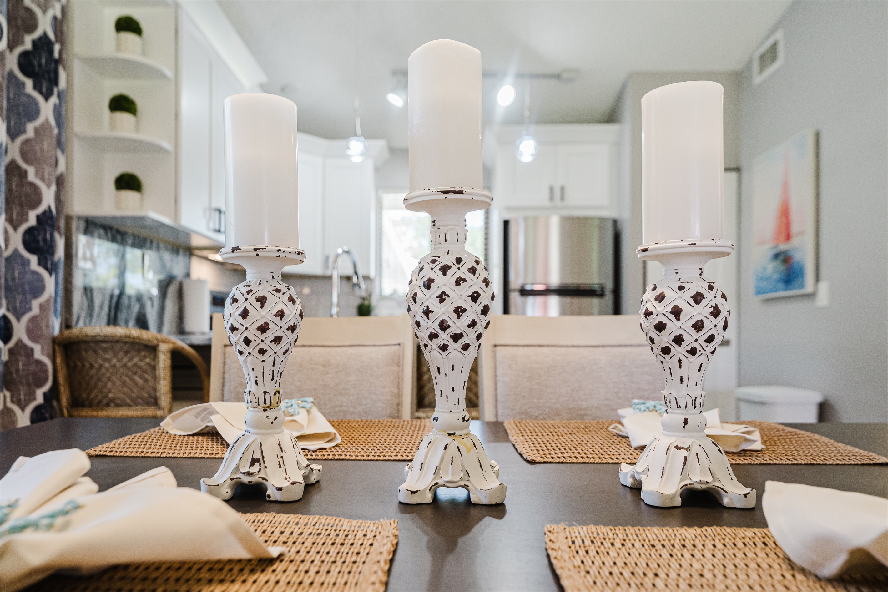 Bright open-concept living with dining for 6 and a fully upgraded kitchen featuring modern finishes, breakfast bar seating, and everything you need to cook and entertain
