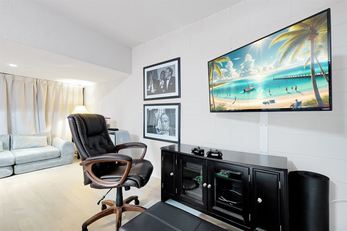 Gameroom area with TV and video games