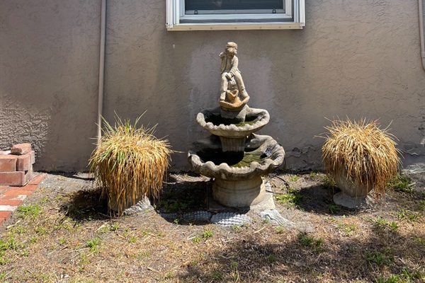 Enjoy the garden views and statuettes all around the property.